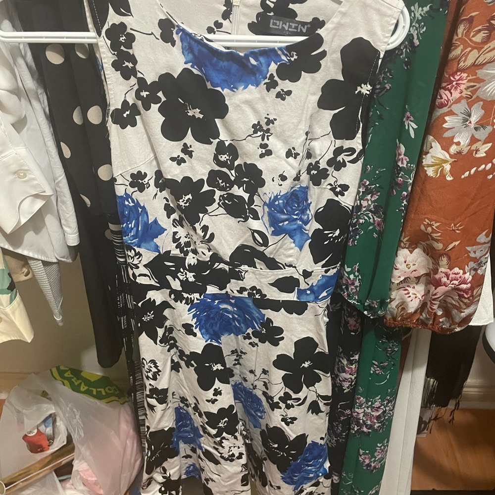Sleeveless mid length black and blue floral dress